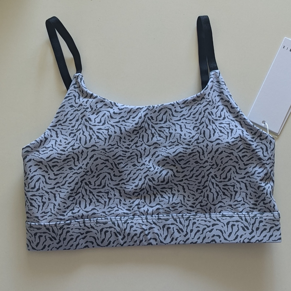 {All Fenix} Brand New Powder Cheetah Sports Bra